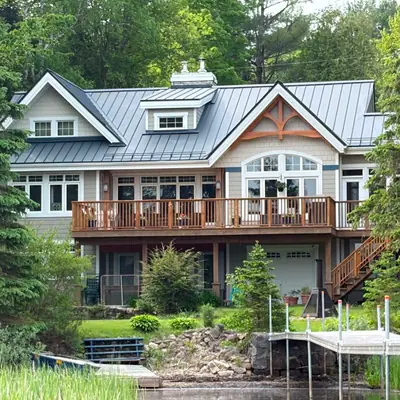 Standing seam roof charcoal grey on a lakeside home